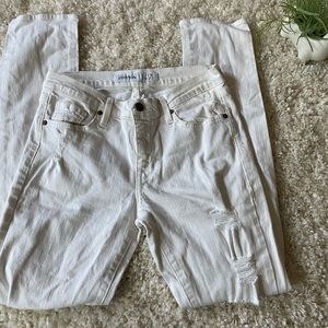Just USA distressed all white straight leg skinny denim jeans.
